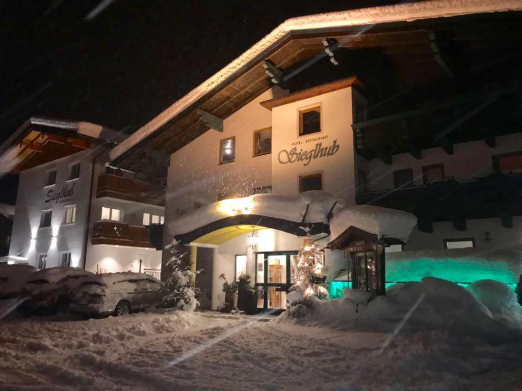 Sieglhub Chalets - Appartements - Hotel Флахау Экстерьер фото